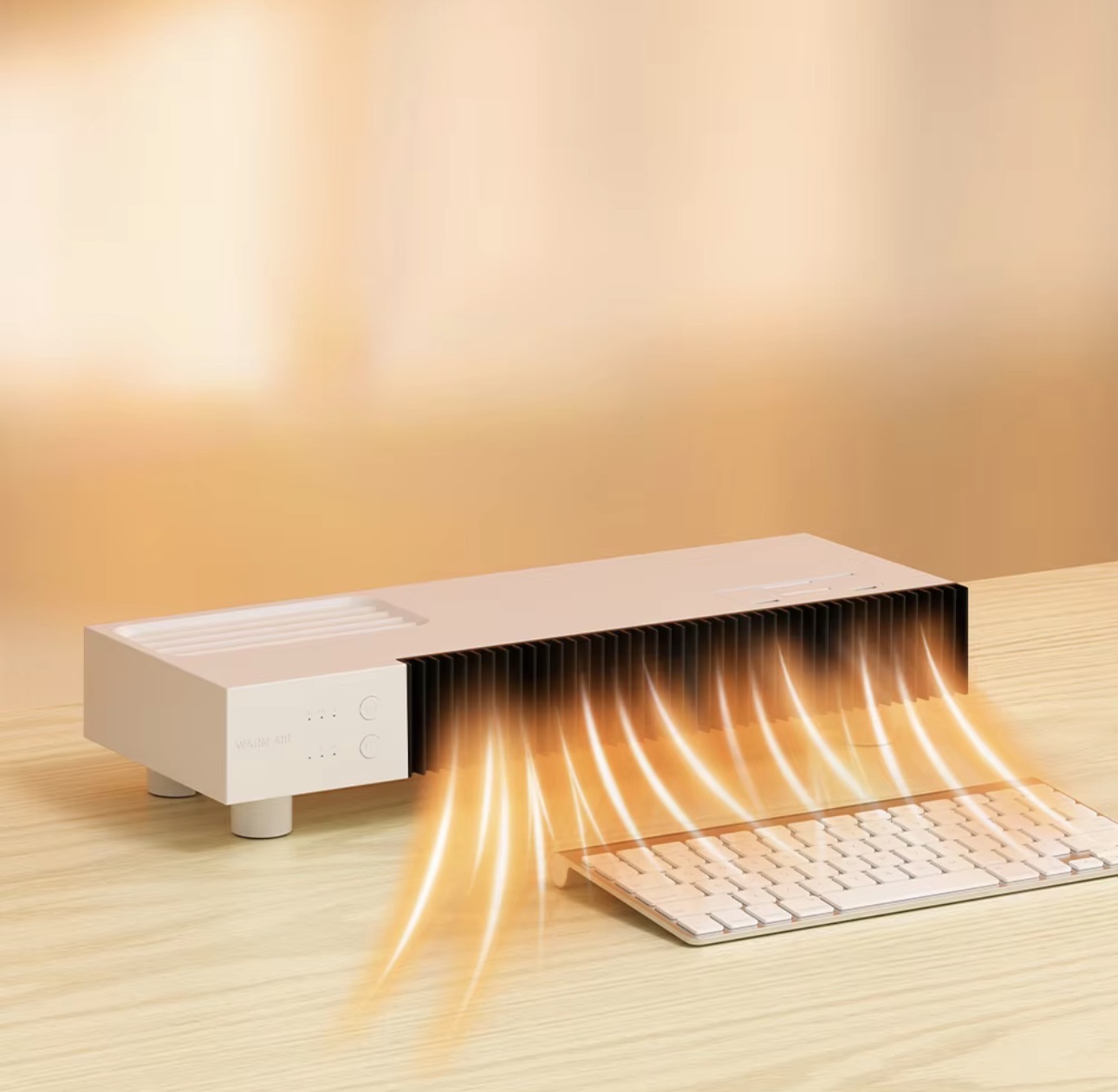 Warm Air Desk Heater sending heat across a keyboard and hands